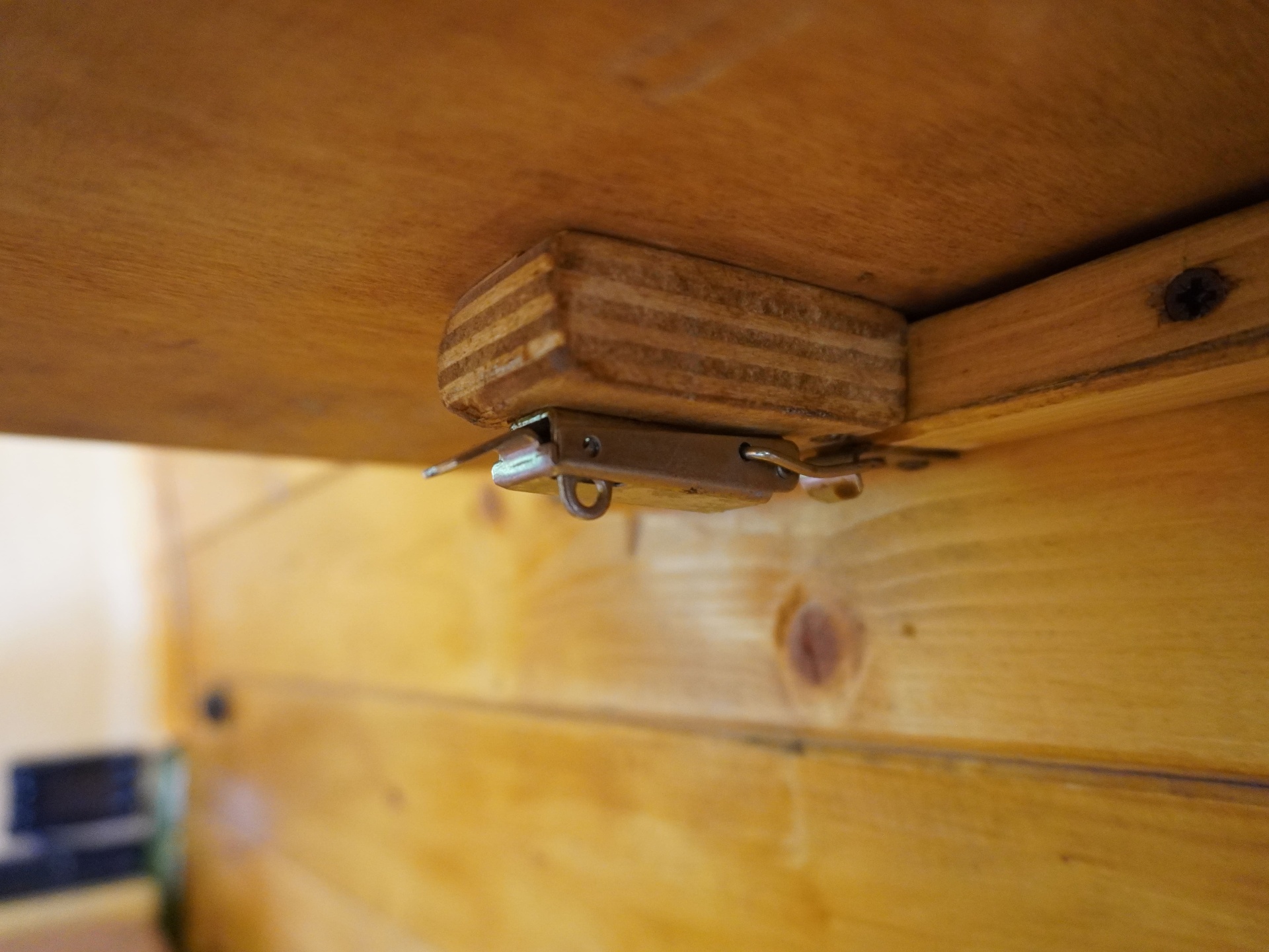 Cabinet latch detail - handmade plywood catch